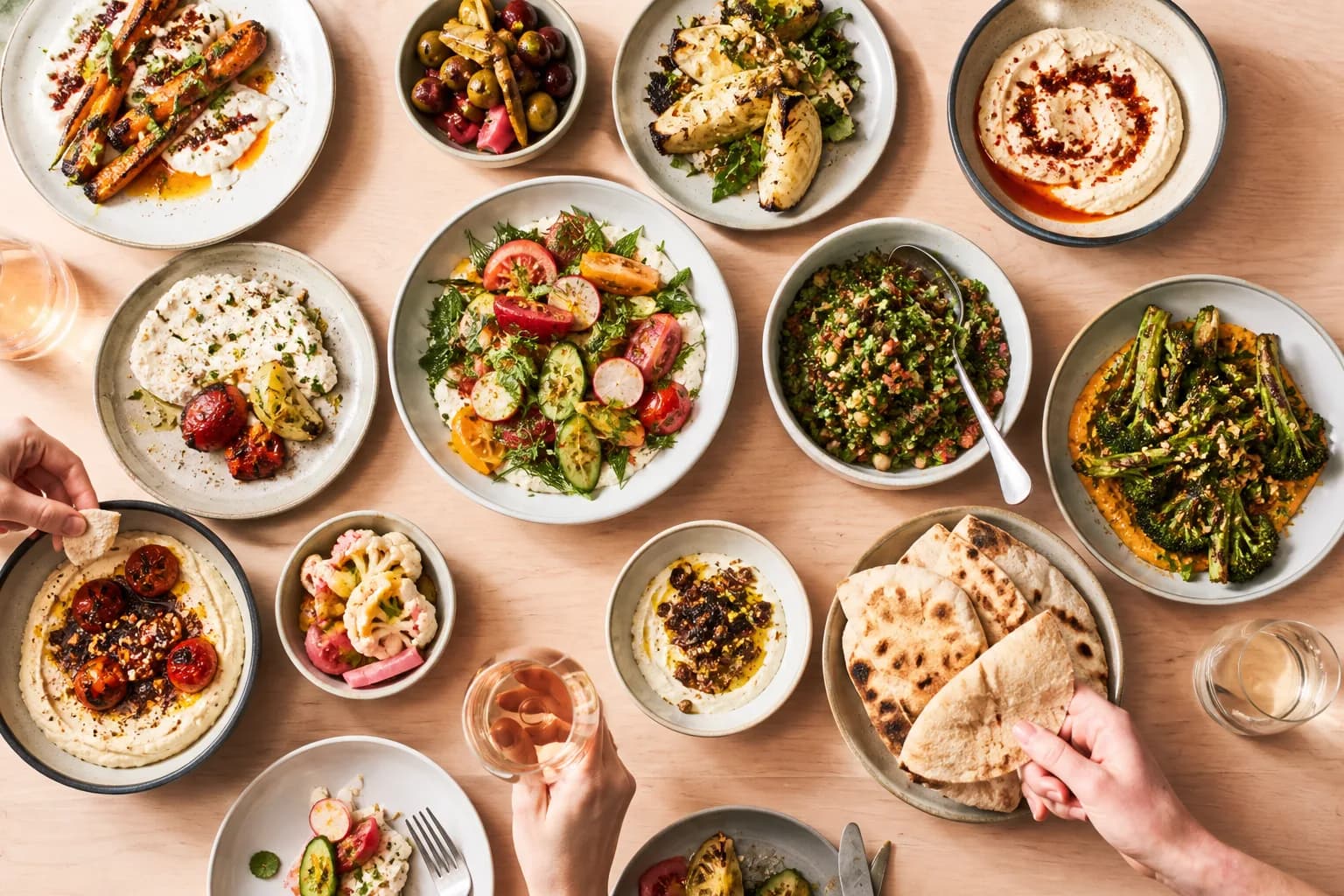 An overhead spread of Mediterranean vegetable plates at Tusk on E Burnside in Portland