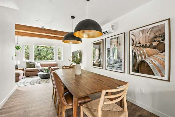 Dining room with table and living room beyond.