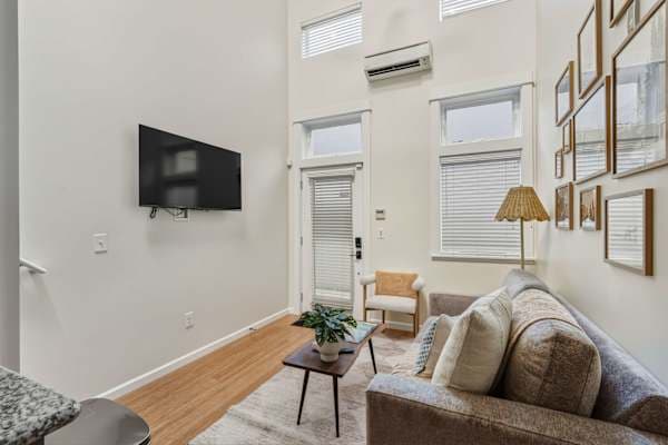 Living room with sofa and TV.