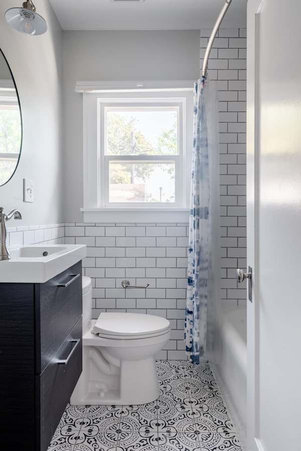 Full bathroom 1 with tile shower.