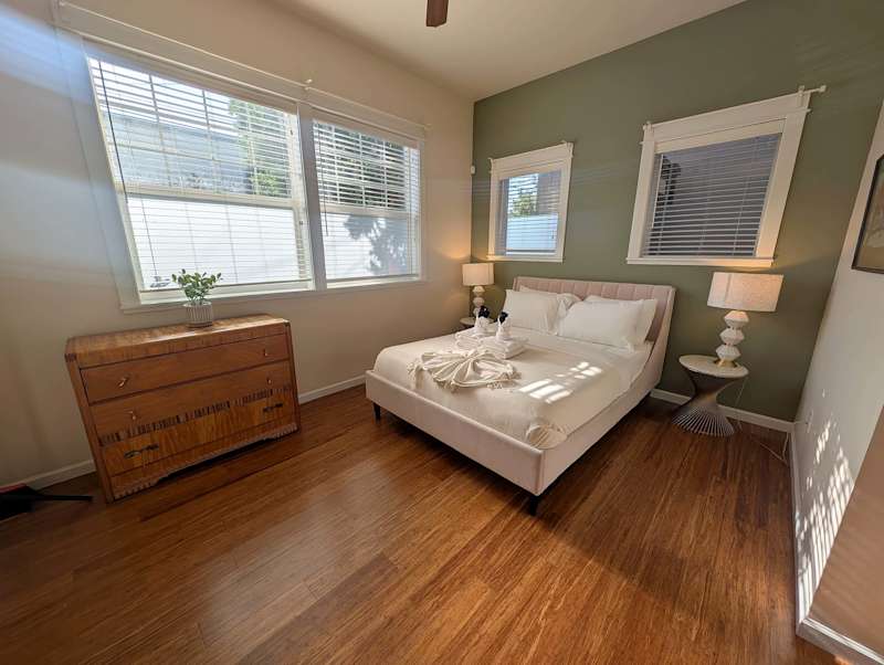 Vaulted-Ceiling Studio · Full Kitchen + Laundry